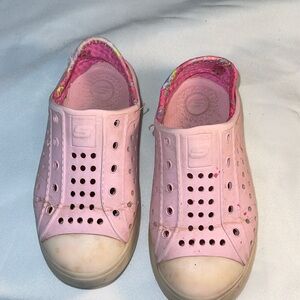 Skechers waterproof in “natives” style, pink size 10.  Some wear.